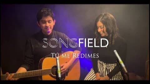 Portada de «Tú me Redimes»: Aldo y María Teomitzi, del proyecto Songfield, tocando guitarra acústica